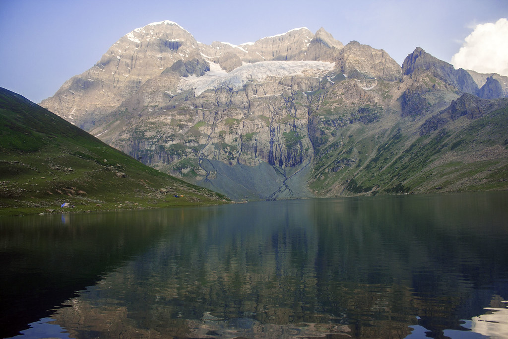 Mount Harmukh and visible glacier reflected in calm Gangbal Lake during Kashmir Great Lakes Trek